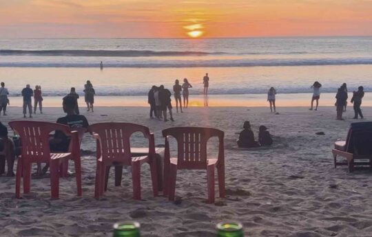 View of Kuta beach in Bali at sunset