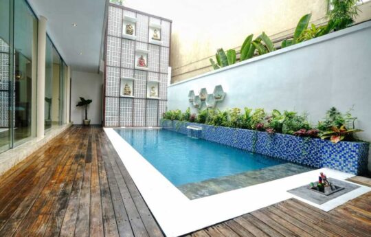 Beautiful Bali Villa Exterior and swimming pool area with deck