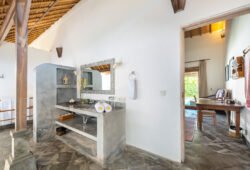 En suite bathroom with vanities