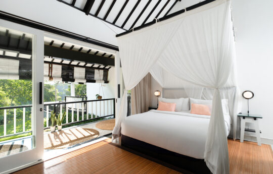 luxury bedroom of villa with garden views