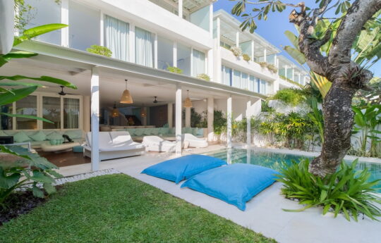 Daytime swimming pool and garden views of Villa Surga in Seminyak Bali