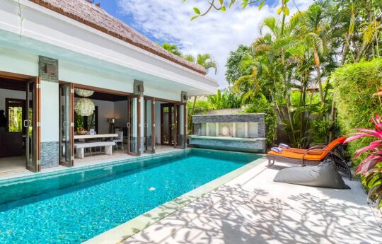 Swimming pool and tropical garden views of Villa Menari in Seminyak Bali