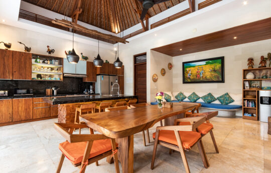 Wooden dining table of villa with seat for 6 people