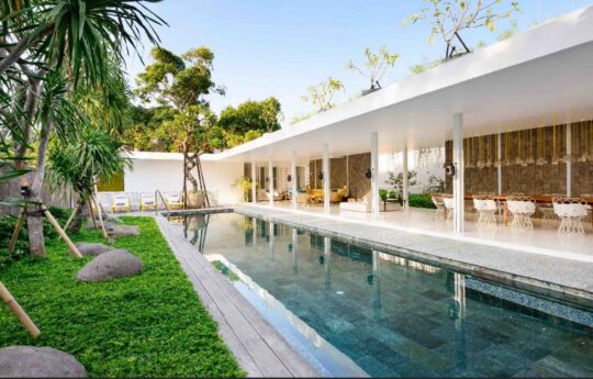 Villa 1880 swimming pool, garden and living areas on sunny day