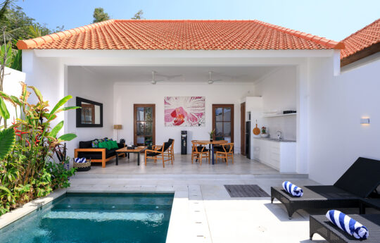 View of villa exterior, swimming pool and living areas